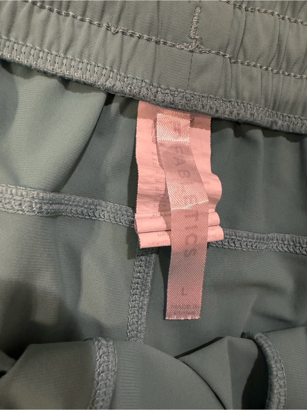 Fabletics Sea-foam Green Drawstring Workout Shorts with zipper pockets - Picture 4 of 13